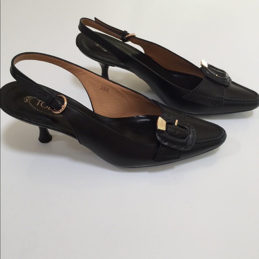 Tod’s black heel with gold buckle